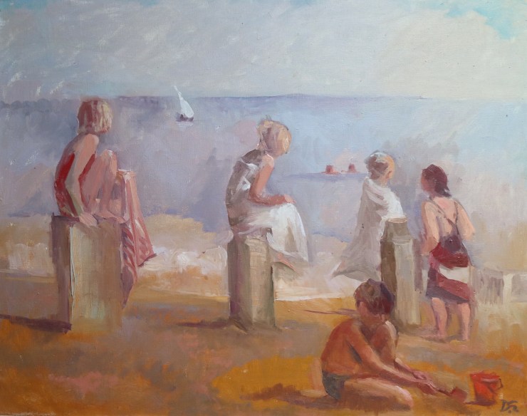 children sitting on groynes