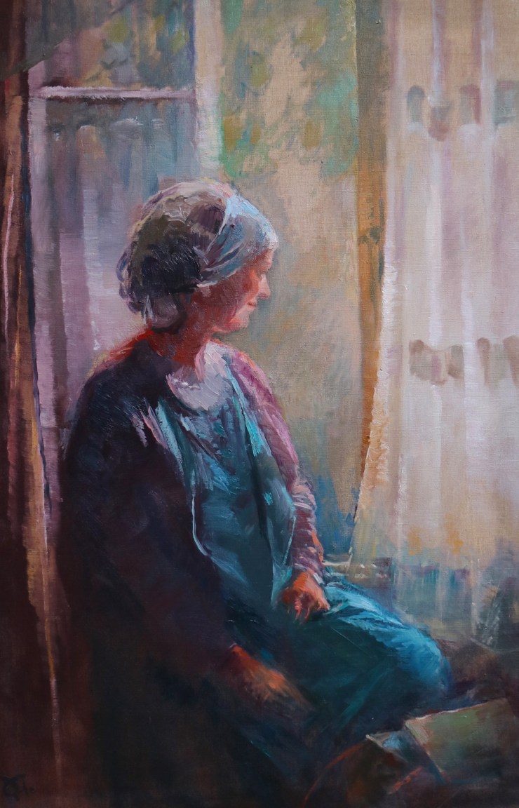 Woman gazing by the window