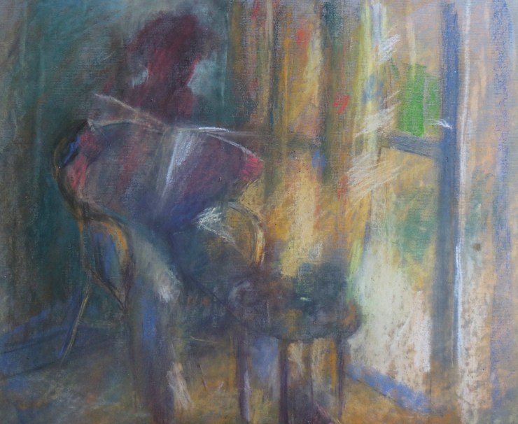 Woman reading newspaper